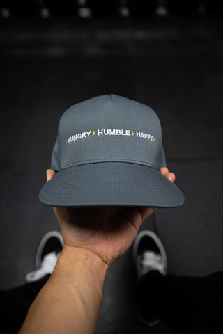HUNGRY HUMBLE HAPPY 5 PANEL SNAPBACK - GREY/WHITE/GOLD